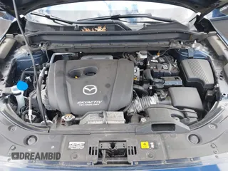 2019 Mazda CX-5 Grand Touring with VIN JM3KFBDM2K0603400, listed as a IAAI auction lot 42051135 with 59,448 mi miles and . Bid and sale history available at DreamBid. Image 10.