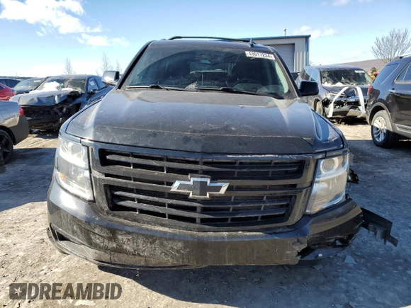 2019 Chevrolet Suburban Premier with VIN 1GNSKJKC7KR146871, listed as a Copart auction lot 43017234 with 96,965 mi miles and Salvage Title. Bid and sale history available at DreamBid. Image 5.