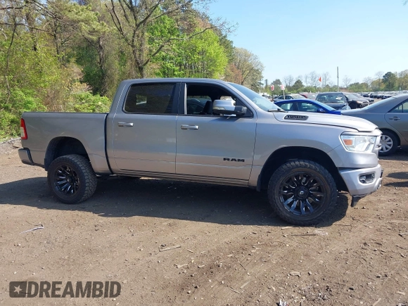 2019 Ram 1500 Big Horn z VIN 1C6SRFFT6KN733556, wystawiony jako IAAI lot #42151868 z przebiegiem 54 222 mil mil oraz . Historia ofert i sprzedaży dostępna na DreamBid. Obrazek 13.