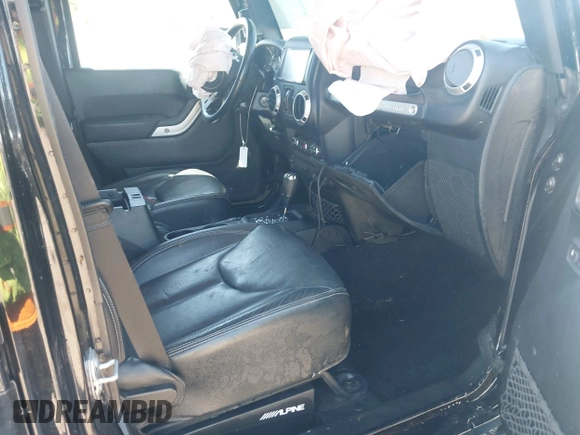 2017 Jeep Wrangler Unlimited Sahara with VIN 1C4BJWEG4HL637482, listed as a IAAI auction lot 41951349 with 76,030 mi miles. Bid and sale history available at carsss.com. Image 5.