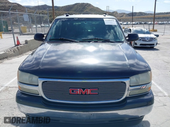2005 GMC Yukon SLT z VIN 1GKEC13T25J178152, wystawiony jako IAAI lot #41685936 z przebiegiem 226 765 mil mil oraz . Historia ofert i sprzedaży dostępna na DreamBid. Obrazek 12.