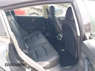 2022 Tesla Model 3 Long Range with VIN 5YJ3E1EB7NF241996, listed as a IAAI auction lot 42115915 with 23,433 mi miles and . Bid and sale history available at DreamBid. Image 8.