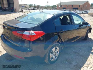 2015 Kia Forte LX with VIN KNAFX4A69F5268750, listed as a IAAI auction lot 41733802 with 234,049 mi miles. Bid and sale history available at carsss.com. Image 4.