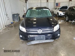 2013 Volkswagen Tiguan S with VIN WVGAV3AX1DW602083, listed as a Copart auction lot 57977515 with 114,375 mi miles and Clean title. Bid and sale history available at DreamBid. Image 5.