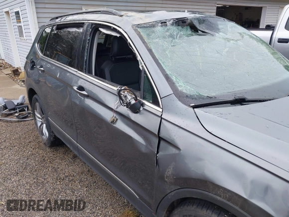 2021 Volkswagen Tiguan SE z VIN 3VV2B7AXXMM070228, wystawiony jako IAAI lot #42295644 z przebiegiem 89 576 mil mil oraz . Historia ofert i sprzedaży dostępna na DreamBid. Obrazek 13.