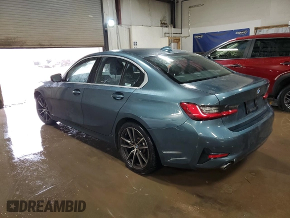 2019 BMW 3 Series 330i with VIN WBA5R1C51KFH14244, listed as a Copart auction lot 52199945 with 45,365 mi miles and Salvage title. Bid and sale history available at DreamBid. Image 2.