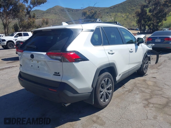 2024 Toyota RAV4 Hybrid XLE Premium with VIN JTMB6RFV3RJ059534, listed as a IAAI auction lot 41716721 with 6,319 mi miles. Bid and sale history available at carsss.com. Image 4.