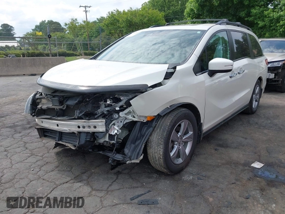 2018 Honda Odyssey EX-L with VIN 5FNRL6H77JB047919, listed as a IAAI auction lot 42112505 with 108,706 mi miles and . Bid and sale history available at DreamBid. Image 2.