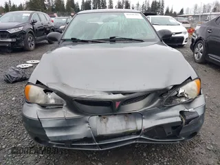 2004 Pontiac Grand Am SE with VIN 1G2NE52F94M530881, listed as a IAAI auction lot 41648302 with 116,540 mi miles. Bid and sale history available at carsss.com. Image 13.