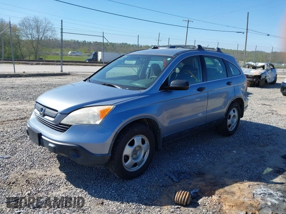 2007 Honda CR-V LX with VIN JHLRE38357C055256, listed as a IAAI auction lot 42050441 with 311,062 mi miles. Bid and sale history available at carsss.com. Image 2.