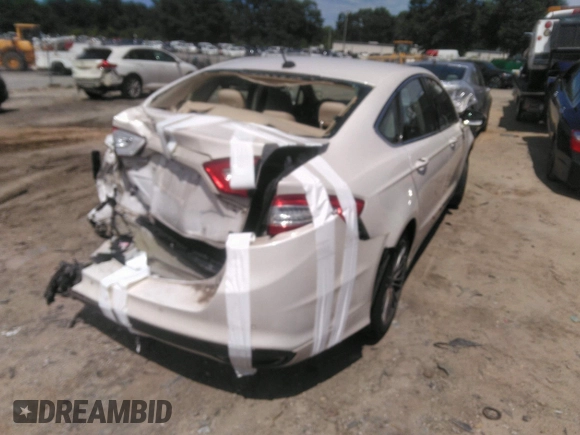 2016 Ford Fusion SE with VIN 3FA6P0H9XGR363785, listed as a IAAI auction lot 42312744 with 151,919 mi miles and . Bid and sale history available at DreamBid. Image 4.
