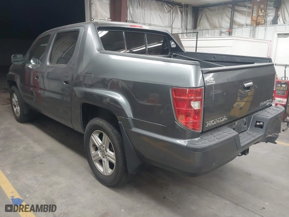 2011 Honda Ridgeline RTL with VIN 5FPYK1F57BB004189, listed as a IAAI auction lot 41871741 with 193,913 mi miles. Bid and sale history available at carsss.com. Image 3.