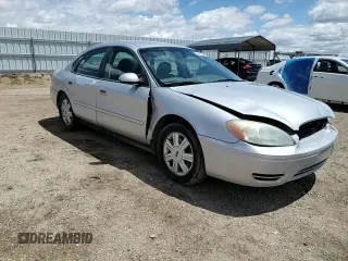 2007 Ford Taurus SEL z VIN 1FAFP56UX7A156005, wystawiony jako Copart lot #54691695 z przebiegiem 152 197 mil mil oraz Szkoda całkowita • Salvage title. Historia ofert i sprzedaży dostępna na DreamBid. Obrazek 13.