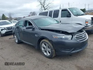 2015 Ford Taurus SEL z VIN 1FAHP2E80FG208944, wystawiony jako IAAI lot #42027817 z przebiegiem 124 882 mil mil oraz . Historia ofert i sprzedaży dostępna na DreamBid. Obrazek 1.