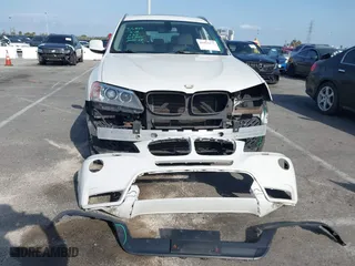 2011 BMW X3 28i with VIN 5UXWX5C52BL715405, listed as a IAAI auction lot 41915177 with 142,199 mi miles. Bid and sale history available at carsss.com. Image 6.