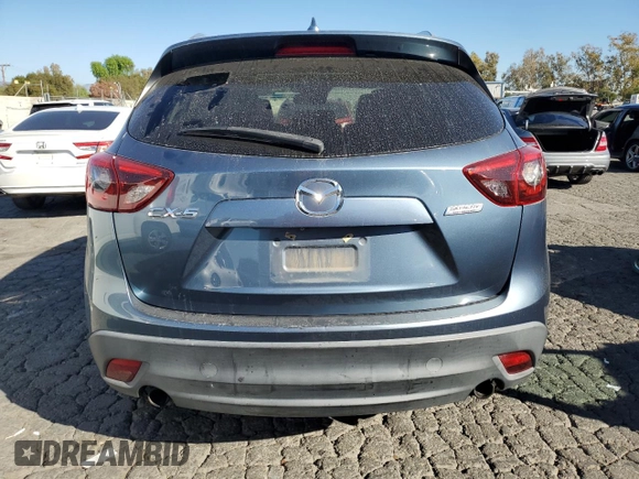 2016 Mazda CX-5 Grand Touring with VIN JM3KE2DY8G0644790, listed as a Copart auction lot 82060424 with 0 mi miles and Clean Title. Bid and sale history available at carsss.com. Image 6.