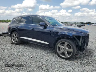 2022 Genesis GV80 z VIN KMUHCESC8NU100536, wystawiony jako Copart lot #56201335 z przebiegiem 23 427 mil mil oraz Szkody całkowita. Historia ofert i sprzedaży dostępna na DreamBid. Obrazek 4.