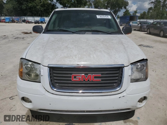 2005 GMC Envoy SLT with VIN 1GKDT13S052311455, listed as a Copart auction lot 73635434 with Not Provided miles and Salvage Title. Bid and sale history available at DreamBid. Image 5.