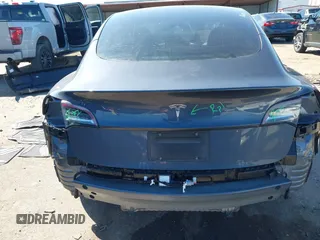 2022 Tesla Model 3 with VIN 5YJ3E1EAXNF326354, listed as a IAAI auction lot 41651872 with 27,922 mi miles and . Bid and sale history available at DreamBid. Image 17.