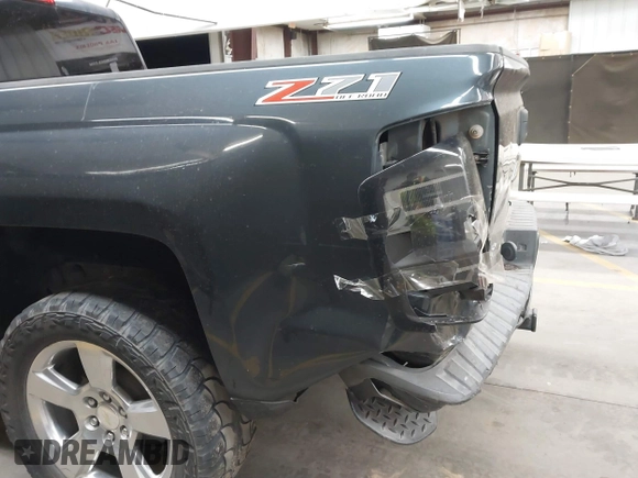 2017 Chevrolet Silverado 1500 LT with VIN 1GCUKREC4HF179560, listed as a IAAI auction lot 41460202 with 136,675 mi miles and . Bid and sale history available at DreamBid. Image 6.