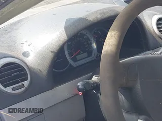 2006 Suzuki Forenza z VIN KL5JD86Z06K325179, wystawiony jako IAAI lot #42507357 z przebiegiem Nie podano mil oraz . Historia ofert i sprzedaży dostępna na DreamBid. Obrazek 7.