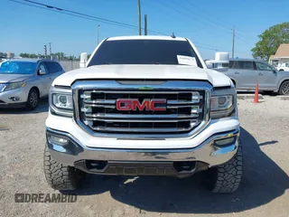 2017 GMC Sierra 1500 SLT z VIN 3GTU2NEC2HG474079, wystawiony jako IAAI lot #41899673 z przebiegiem 104 033 mil mil oraz . Historia ofert i sprzedaży dostępna na DreamBid. Obrazek 12.