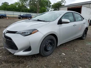 2019 Toyota Corolla L z VIN 5YFBURHE8KP898714, wystawiony jako Copart lot #56707395 z przebiegiem 86 665 mil mil oraz Szkoda całkowita • Salvage title. Historia ofert i sprzedaży dostępna na DreamBid. Obrazek 1.
