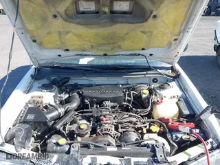 1999 Subaru Forester L with VIN JF1SF6355XH741974, listed as a IAAI auction lot 41973316 with 215,779 mi miles. Bid and sale history available at carsss.com. Image 10.