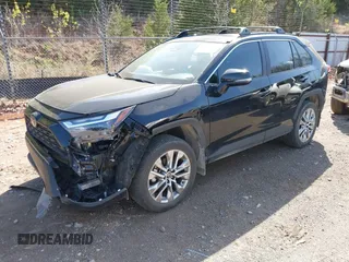 2023 Toyota RAV4 XLE Premium with VIN 2T3C1RFVXPC247647, listed as a IAAI auction lot 41997072 with 27,326 mi miles and . Bid and sale history available at DreamBid. Image 2.