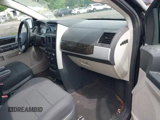 2010 Dodge Grand Caravan SXT with VIN 2D4RN5D11AR459864, listed as a IAAI auction lot 42197818 with 149,553 mi miles and . Bid and sale history available at DreamBid. Image 5.
