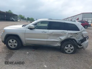 2011 Jeep Grand Cherokee Laredo with VIN 1J4RS4GGXBC564035, listed as a IAAI auction lot 41931861 with 242,291 mi miles and . Bid and sale history available at DreamBid. Image 17.