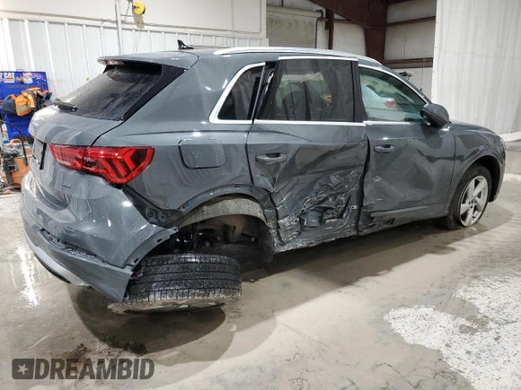 2022 Audi Q3 Premium with VIN WA1AUCF33N1002302, listed as a Copart auction lot 51973985 with 49,886 mi miles and Salvage title. Bid and sale history available at DreamBid. Image 3.