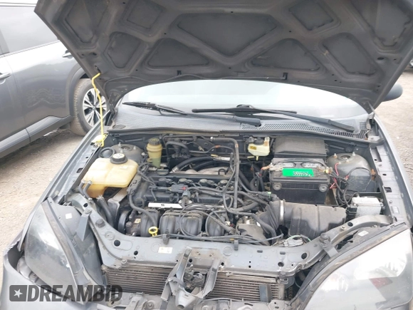 2005 Ford Focus S with VIN 1FAFP34N65W246882, listed as a IAAI auction lot 41894030 with 289,678 mi miles. Bid and sale history available at carsss.com. Image 10.