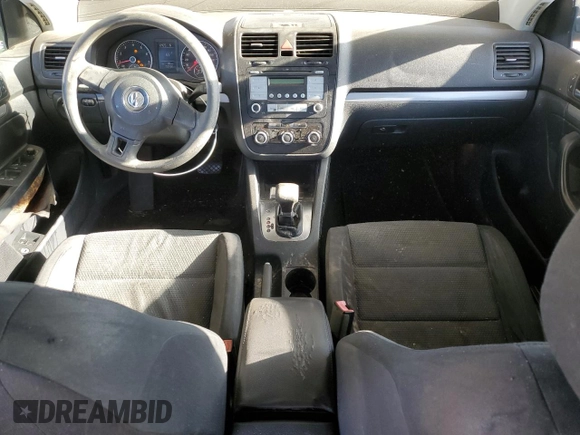 2010 Volkswagen Jetta S with VIN 3VWJZ7AJ7AM051940, listed as a Copart auction lot 54792105 with 159,460 mi miles and Salvage title. Bid and sale history available at DreamBid. Image 8.