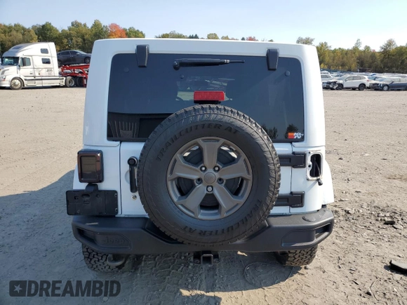2018 Jeep Wrangler JK Unlimited Sport S with VIN 1C4BJWDG9JL885198, listed as a Copart auction lot 75664394 with 84,117 mi miles and Salvage Title. Bid and sale history available at carsss.com. Image 6.