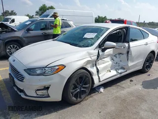 2020 Ford Fusion SE with VIN 3FA6P0HD3LR161093, listed as a IAAI auction lot 42127161 with 59,607 mi miles and . Bid and sale history available at DreamBid. Image 17.