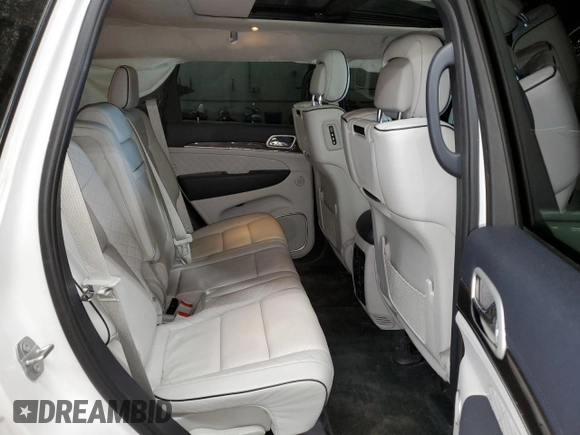 2018 Jeep Grand Cherokee Summit with VIN 1C4RJFJT5JC273869, listed as a Copart auction lot 57482865 with 70,843 mi miles and Salvage title. Bid and sale history available at DreamBid. Image 11.