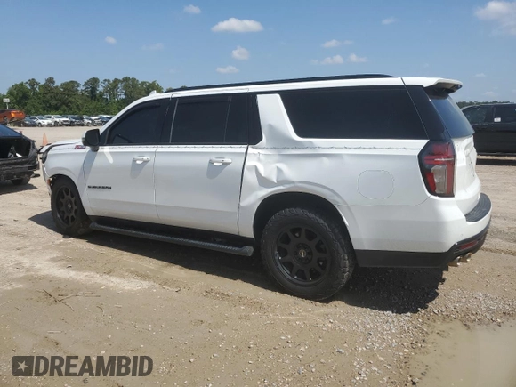 2023 Chevrolet Suburban with VIN 1GNSKDKL5PR286474, listed as a Copart auction lot 55678915 with 96,049 mi miles and Salvage title. Bid and sale history available at DreamBid. Image 2.