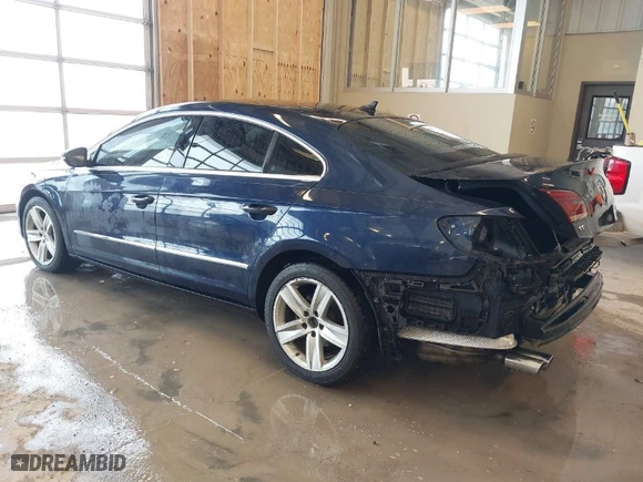 2013 Volkswagen CC Sport with VIN WVWBN7ANXDE515691, listed as a IAAI auction lot 41598295 with 104,461 mi miles. Bid and sale history available at carsss.com. Image 3.