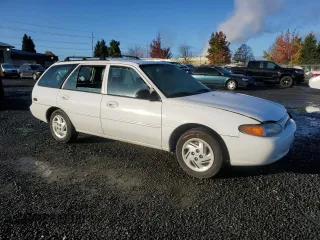 1998 Ford Escort SE with VIN 3FAFP15PXWR242102, listed as a Copart auction lot 77914714 with 164,333 mi miles and Salvage Title. Bid and sale history available at carsss.com. Image 4.