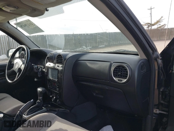 2006 GMC Envoy SLT with VIN 1GKDS13SX62260454, listed as a IAAI auction lot 41479478 with 255,019 mi miles. Bid and sale history available at carsss.com. Image 5.