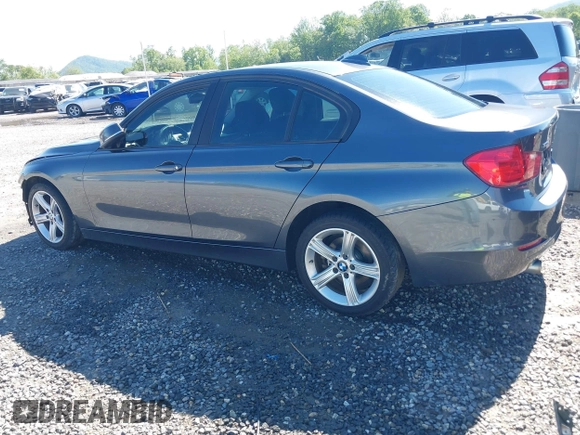 2014 BMW 3 Series 320i xDrive with VIN WBA3C3C54EP661409, listed as a IAAI auction lot 42182593 with 159,104 mi miles and . Bid and sale history available at DreamBid. Image 3.