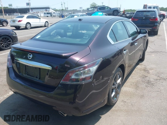 2014 Nissan Maxima SV z VIN 1N4AA5AP7EC486859, wystawiony jako IAAI lot #42420335 z przebiegiem 71 283 mil mil oraz . Historia ofert i sprzedaży dostępna na DreamBid. Obrazek 4.