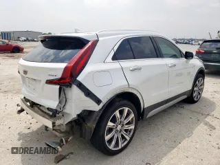 2023 Cadillac XT4 FWD Premium Luxury with VIN 1GYFZCR42PF110122, listed as a Copart auction lot 57332955 with 11,427 mi miles and Salvage title. Bid and sale history available at DreamBid. Image 3.