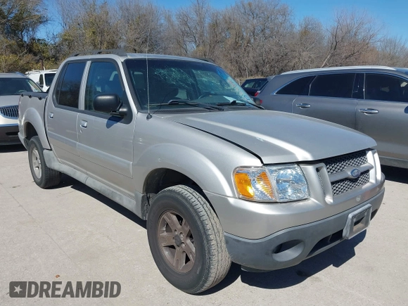 2005 Ford Explorer Sport Trac XLS z VIN 1FMZU67K75UA18027, wystawiony jako IAAI lot #41694106 z przebiegiem 144 900 mil mil oraz . Historia ofert i sprzedaży dostępna na DreamBid. Obrazek 1.