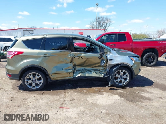 2013 Ford Escape SEL with VIN 1FMCU0HX1DUD51254, listed as a IAAI auction lot 41970516 with 83,616 mi miles. Bid and sale history available at carsss.com. Image 12.