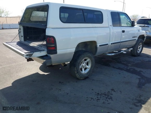 1999 Dodge Ram 1500 with VIN 1B7HF13ZXXJ600062, listed as a IAAI auction lot 41885520 with 217,643 mi miles. Bid and sale history available at carsss.com. Image 4.