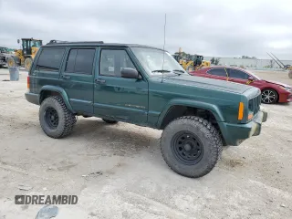 2001 Jeep Cherokee Sport with VIN 1J4FF58SX1L615967, listed as a Copart auction lot 43709235 with 241,326 mi miles and Clean title. Bid and sale history available at DreamBid. Image 4.