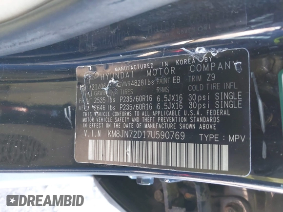 2007 Hyundai Tucson SE with VIN KM8JN72D17U590769, listed as a IAAI auction lot 41003503 with 143,462 mi miles and . Bid and sale history available at DreamBid. Image 9.