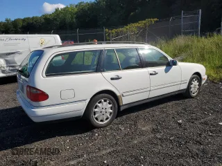 1998 Mercedes-Benz E-Class with VIN WDBJH82FXWX013155, listed as a Copart auction lot 68515674 with 223,294 mi miles and Salvage Title. Bid and sale history available at carsss.com. Image 3.